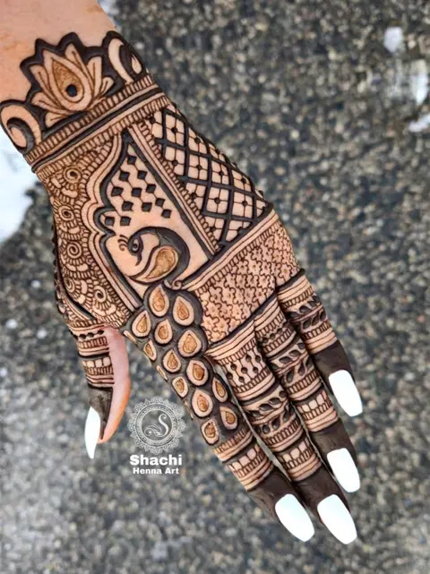 stylish peacock front hand mehndi design