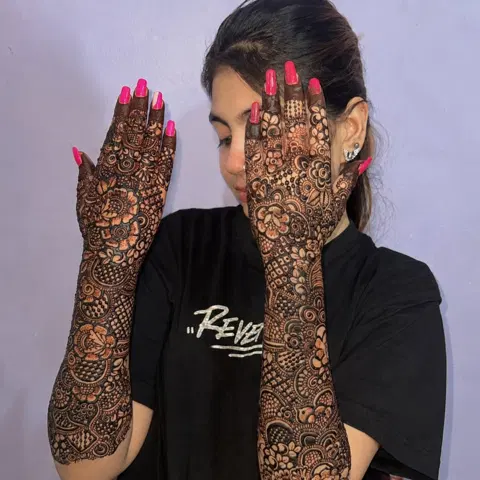 figure full hand mehndi design