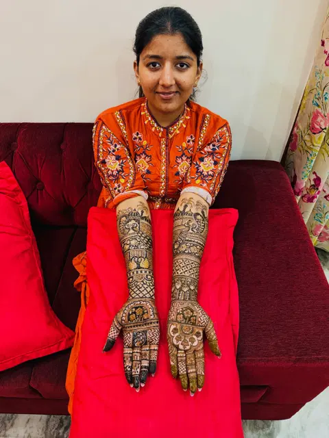figure full hand mehndi design