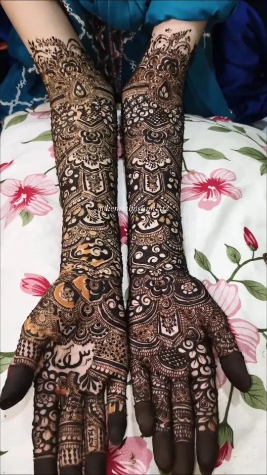 Bridal Mehndi Design with Figures and Hearts