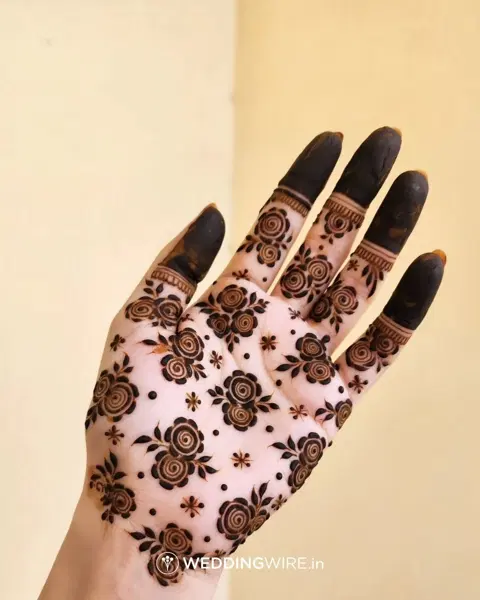 aesthetic dubai flower finger mehndi design