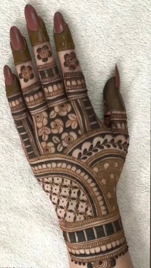 bridal royal back hand mehndi design