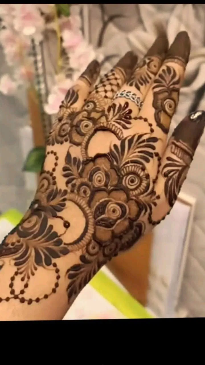 Arabic Royal Back Hand Mehndi Design with Gol Tikki and Flowers