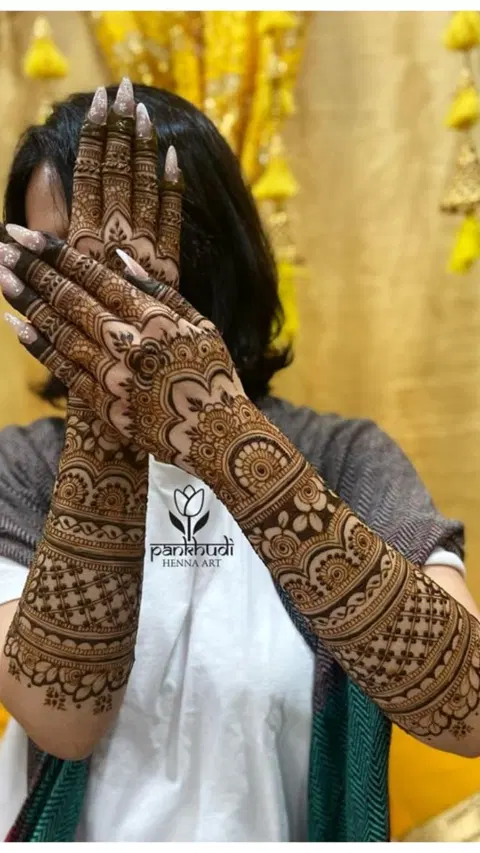 bridal stylish figure arm mehndi design