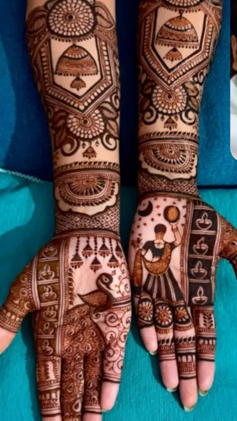 figure full hand mehndi design