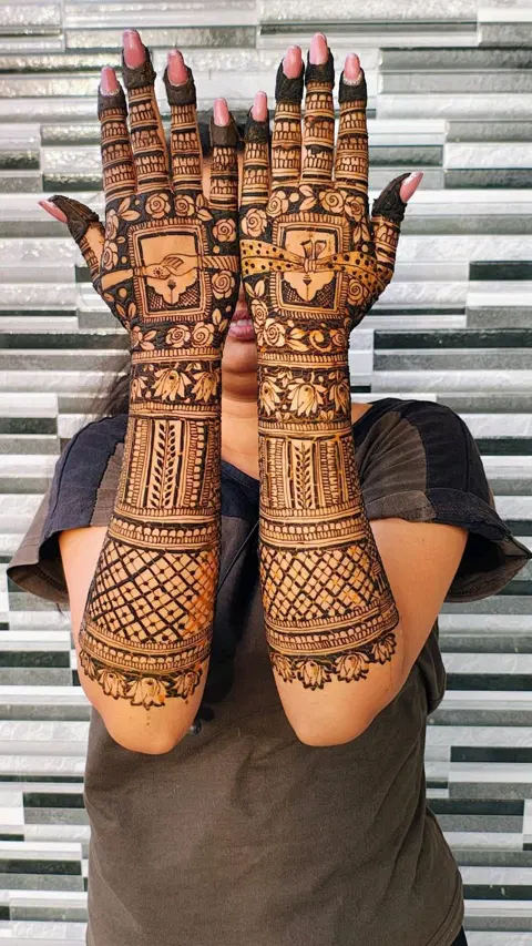 bridal stylish figure arm mehndi design