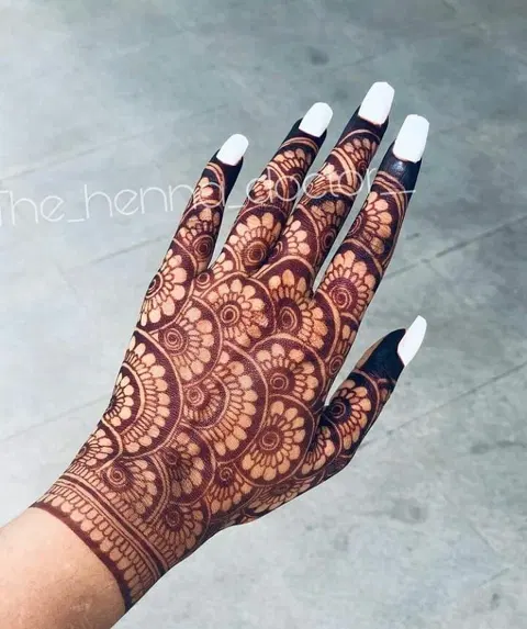 bridal royal circle back hand mehndi design