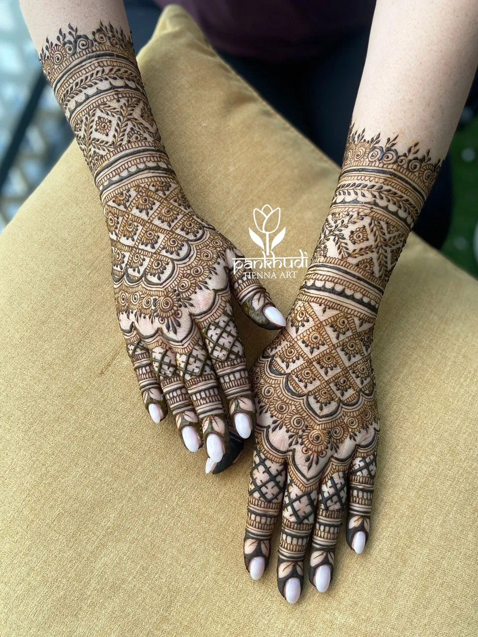 Bridal Stylish Back Hand Mehndi Design with Figures and Hearts for Engagement