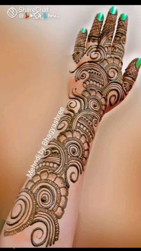 arabic pakistani peacock arm mehndi design