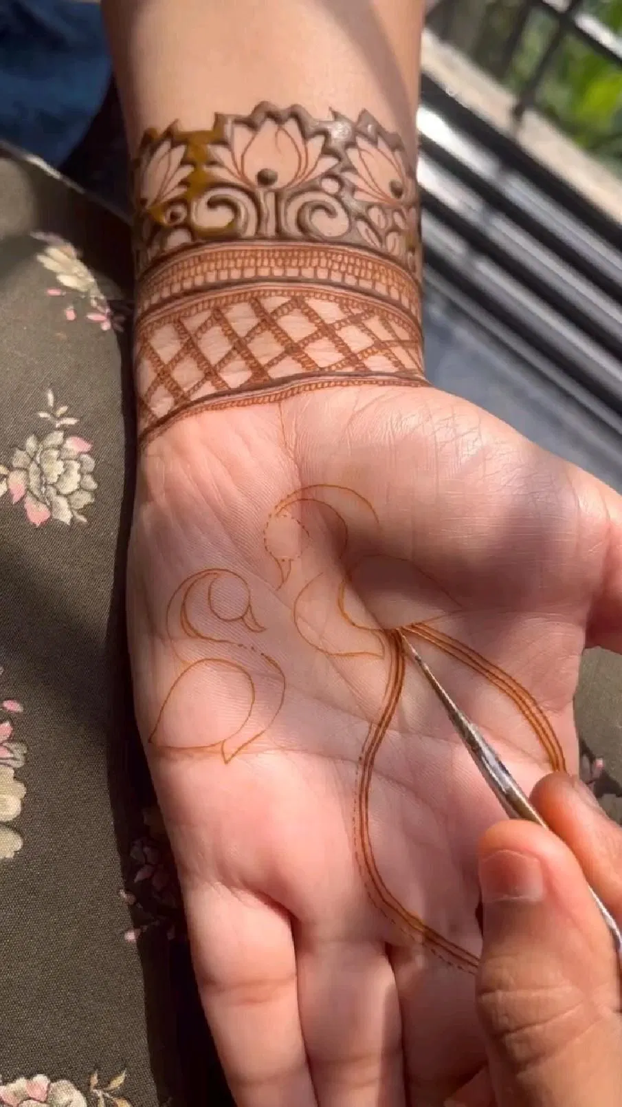 Aesthetic Arabic Back Hand Mehndi Design with Deity and Lotus
