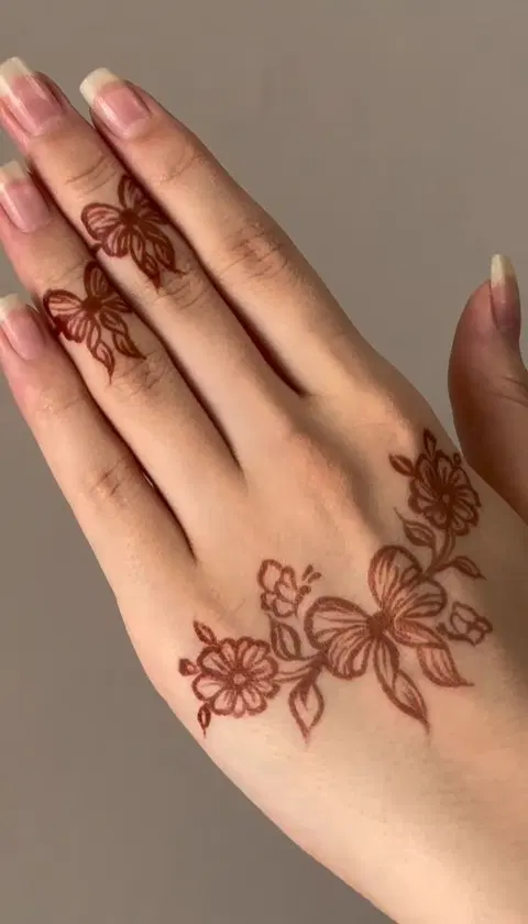 aesthetic arabic jaal back hand mehndi design