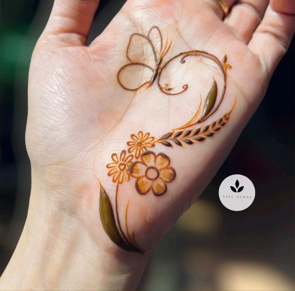 Aesthetic Arabic Finger Mehndi Design with Butterfly and Flowers