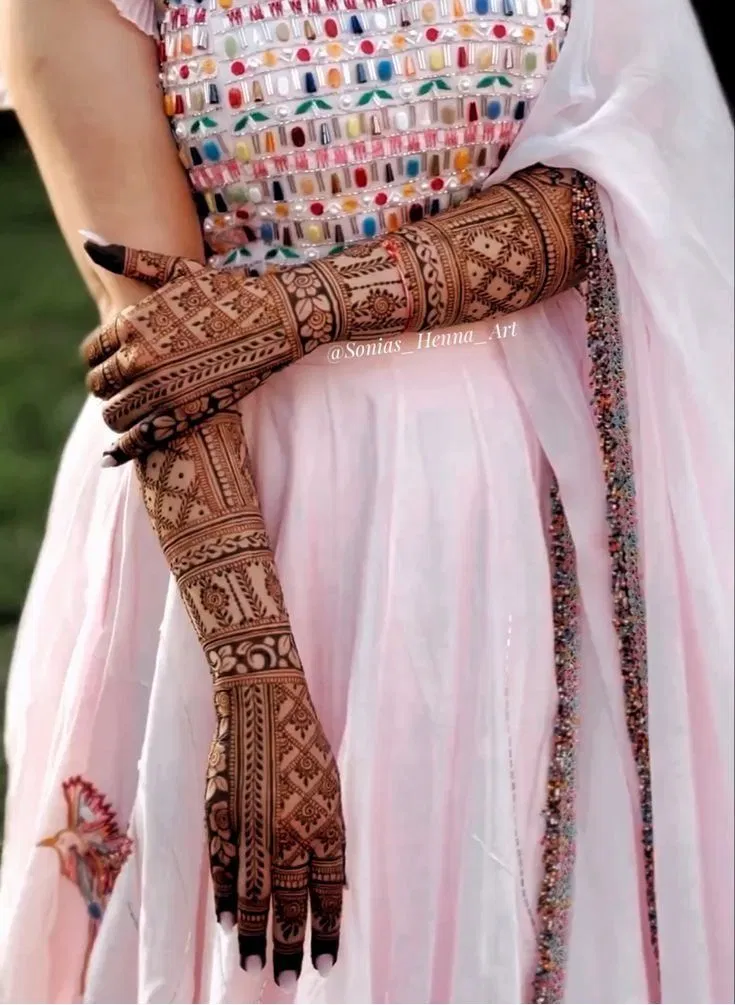 Bridal Indian Arm Mehndi Design with Figures, Flowers and Jaal for Engagement