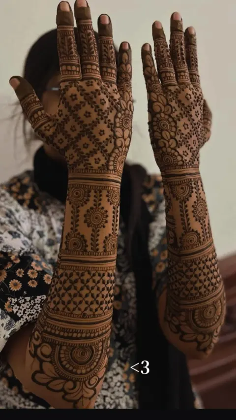 bridal indian figure arm mehndi design
