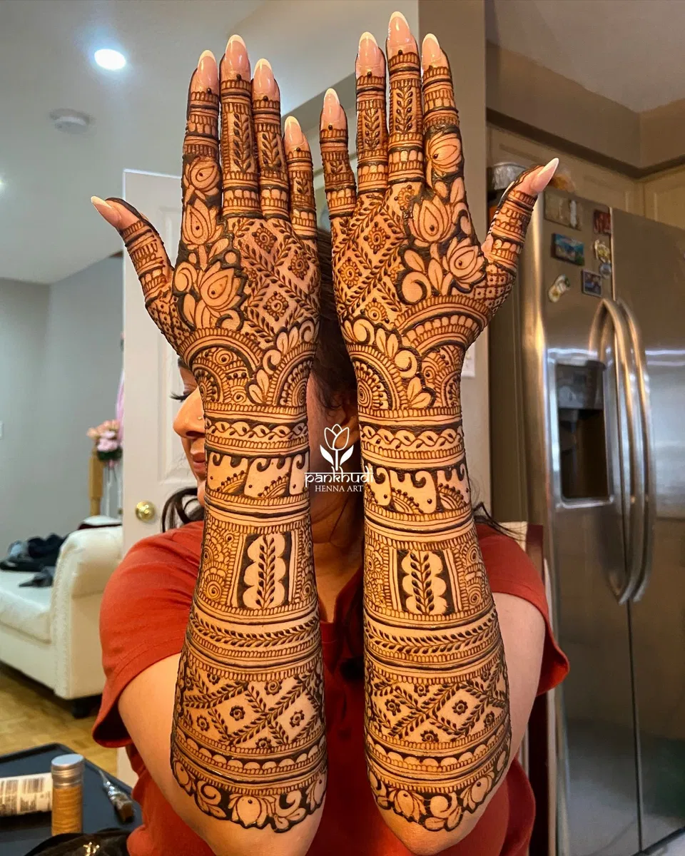 Bridal Back Hand Mehndi Design with Figures and Jaal for Engagement