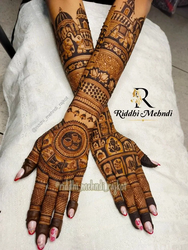 Bridal Stylish Back Hand Mehndi Design with Figures, Hearts and Peacock
