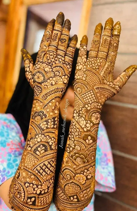 bridal stylish deity arm mehndi design