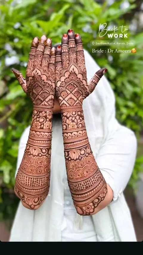 bridal indian figure back hand mehndi design