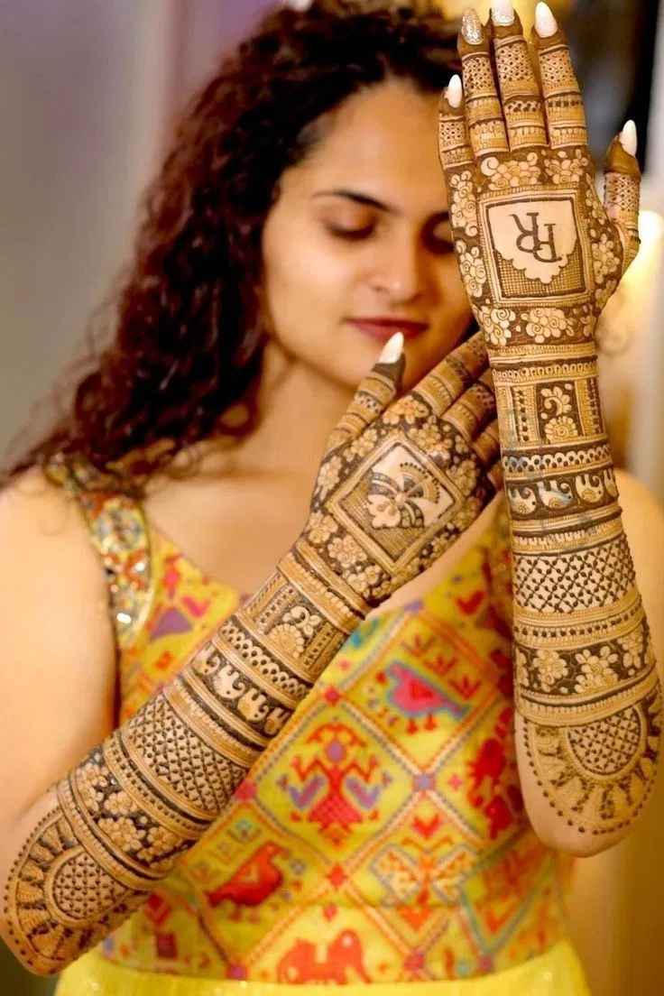 Bridal Simple Back Hand Mehndi Design with Figures