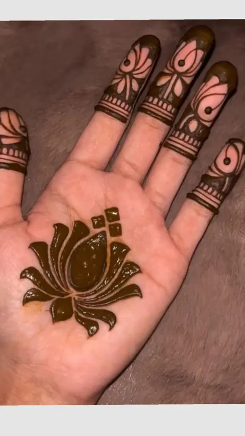 aesthetic simple lotus finger mehndi design