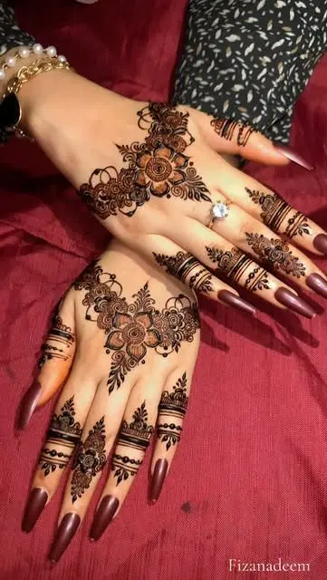 bridal figure back hand mehndi design