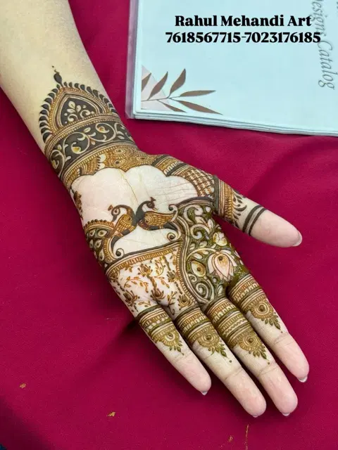 stylish peacock back hand mehndi design