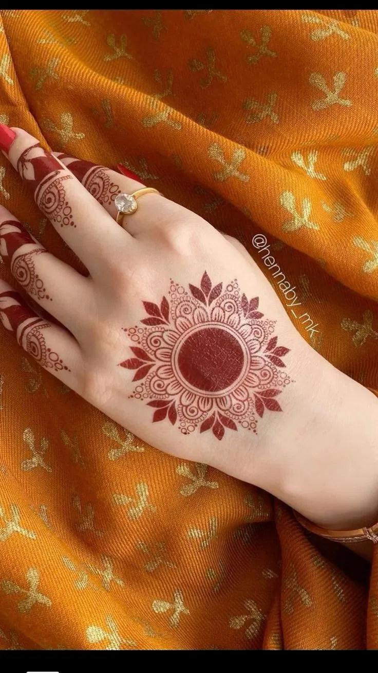 Aesthetic Minimal Back Hand Mehndi Design with Gol Tikki and Flowers for Diwali (6)