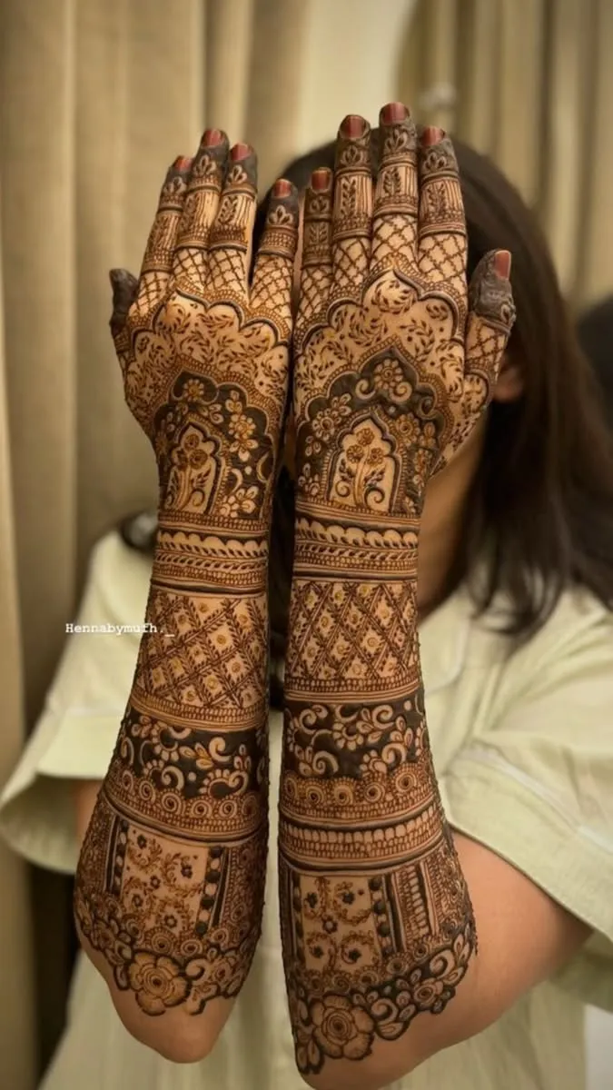Bridal Stylish Arm Mehndi Design with Gol Tikki and Figures