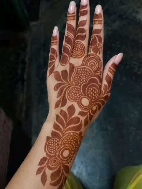 aesthetic arabic flower back hand mehndi design