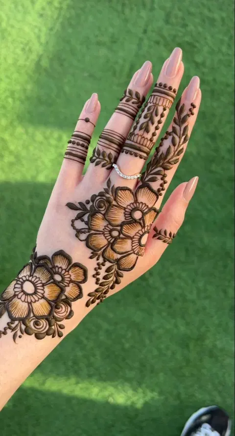 aesthetic arabic flower back hand mehndi design