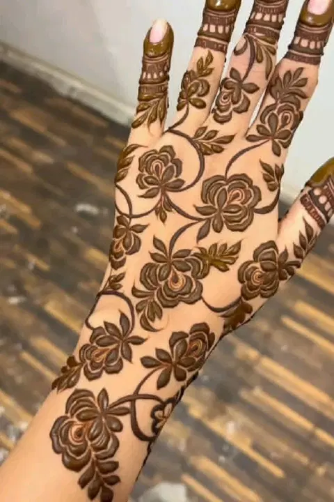 aesthetic arabic flower back hand mehndi design