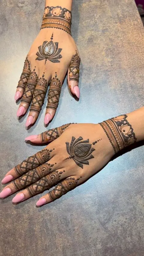 aesthetic bridal flower back hand mehndi design