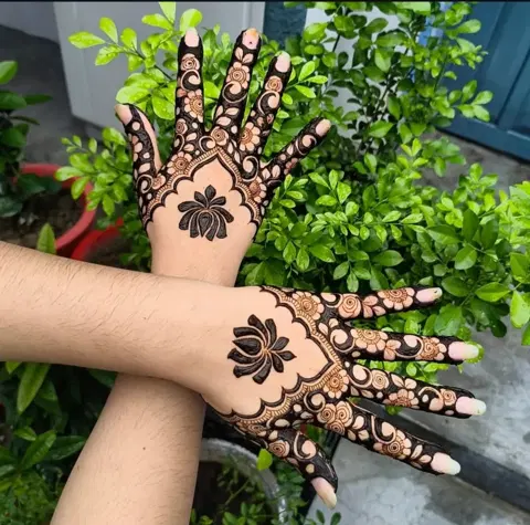 aesthetic arabic flower back hand mehndi design