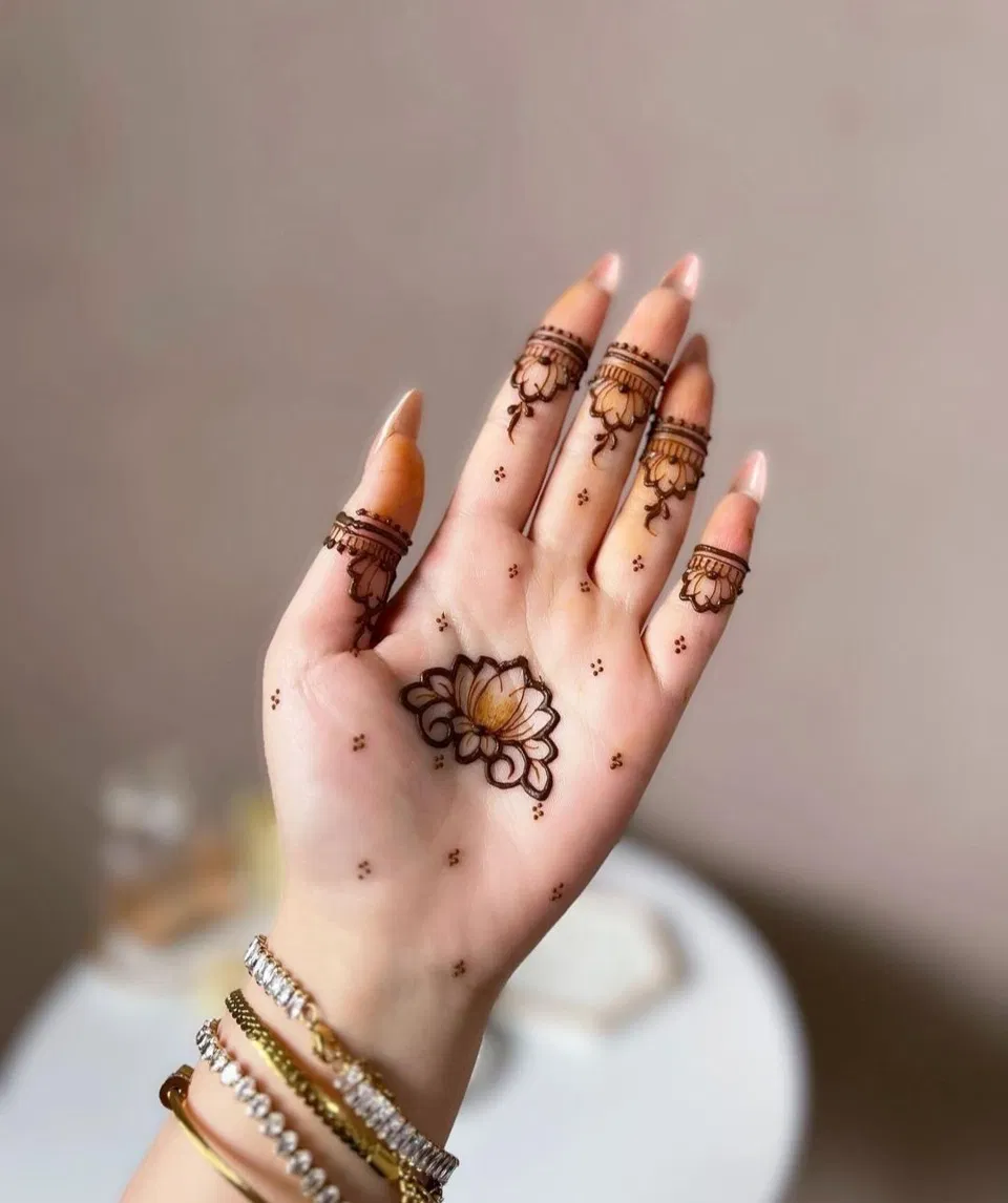 Aesthetic Minimal Finger Mehndi Design with Jaal and Lotus for Diwali