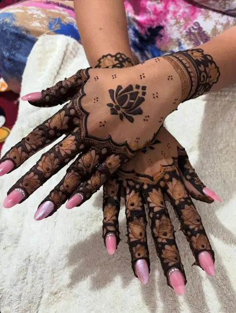 aesthetic royal flower back hand mehndi design