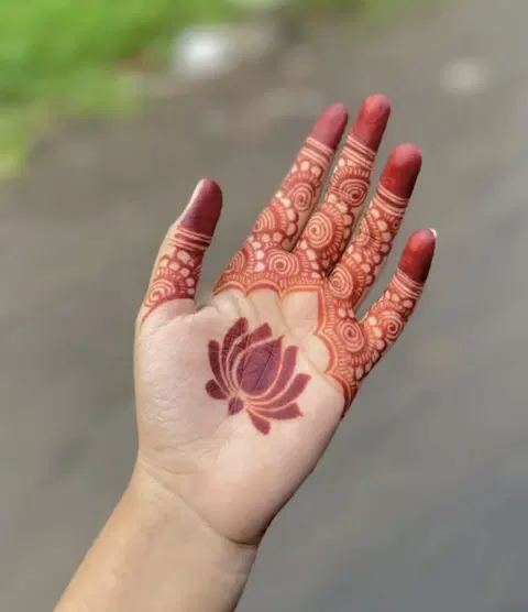 aesthetic simple lotus front hand mehndi design