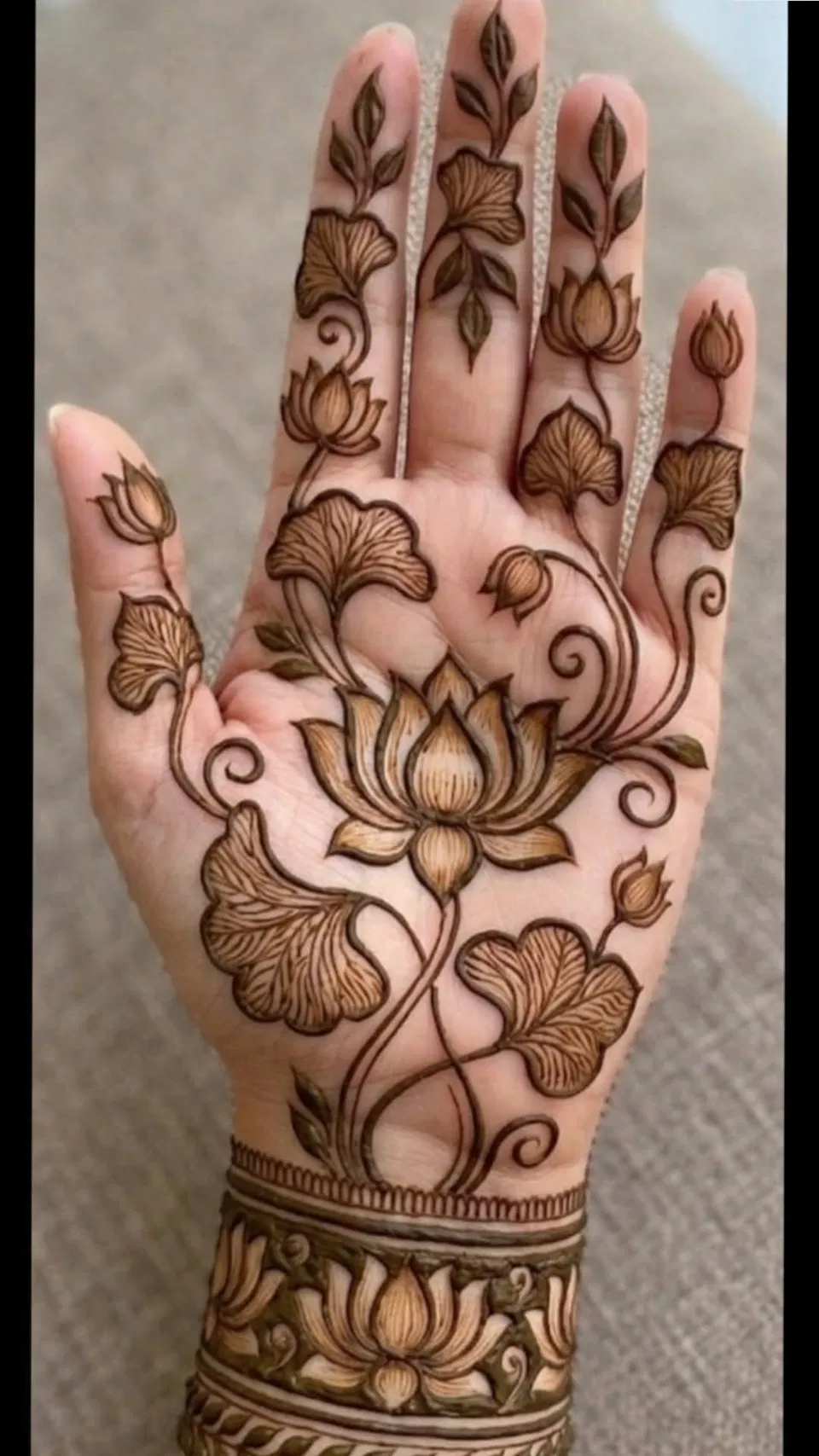 Aesthetic Arabic Back Hand Mehndi Design with Flowers and Lotus (5)
