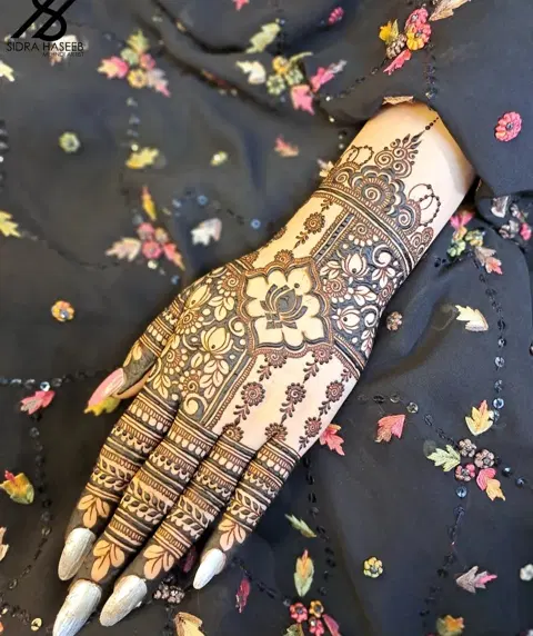 aesthetic bridal flower arm mehndi design