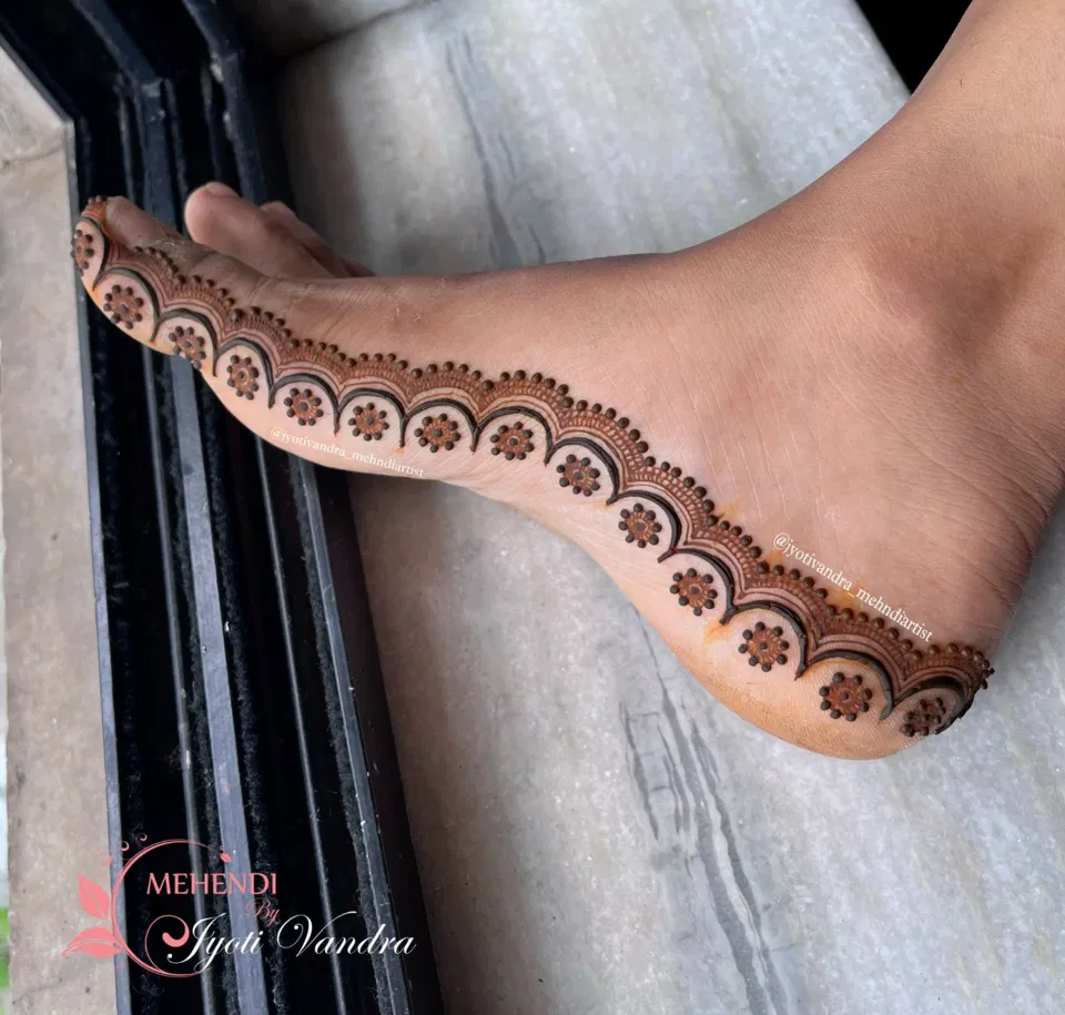 Bridal Minimal Foot Mehndi Design with Bel and Deity