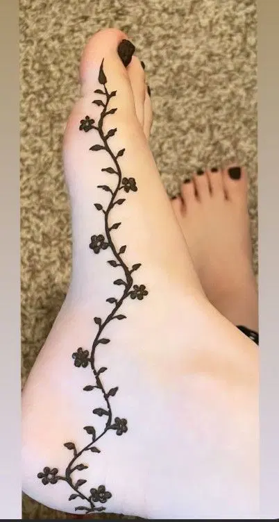 arabic minimal flower back hand mehndi design
