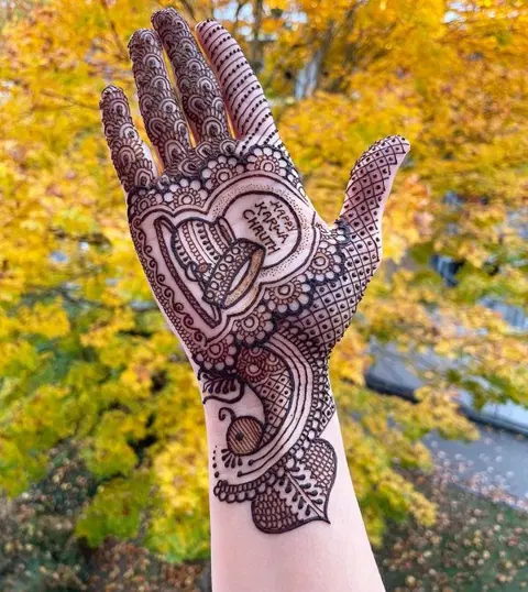 bridal simple circle back hand mehndi design