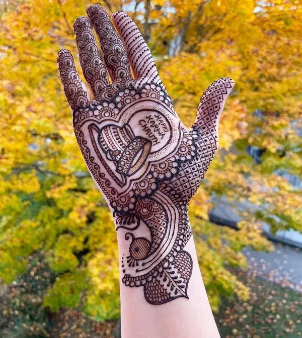 Bridal Simple Back Hand Mehndi Design with Gol Tikki and Hearts