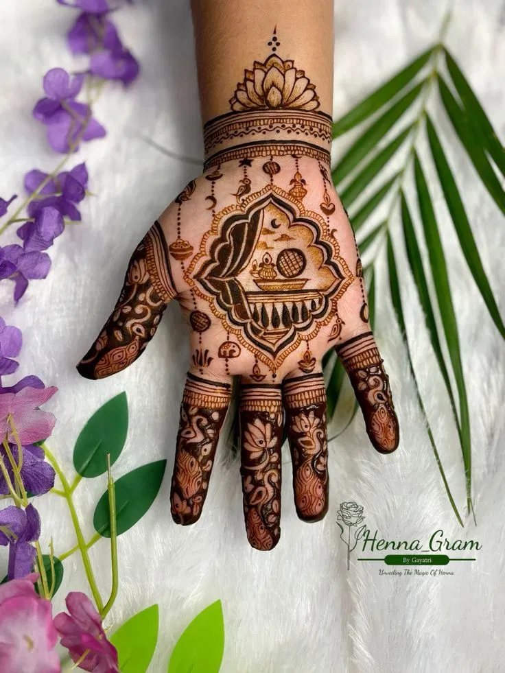 Stylish Front Hand Mehndi Design with Gol Tikki and Flowers for Diwali