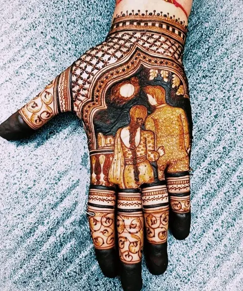 bridal stylish figure back hand mehndi design