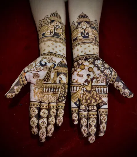 bridal figure back hand mehndi design