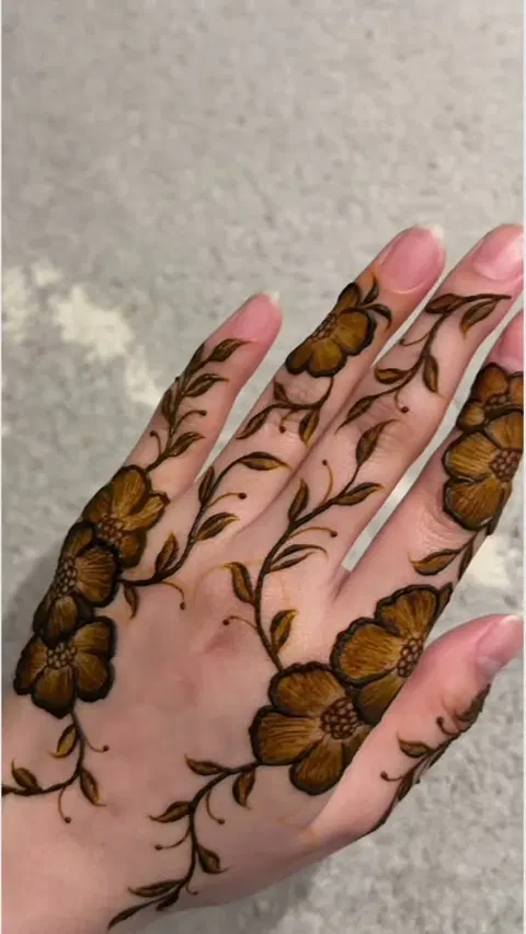 aesthetic arabic flower back hand mehndi design