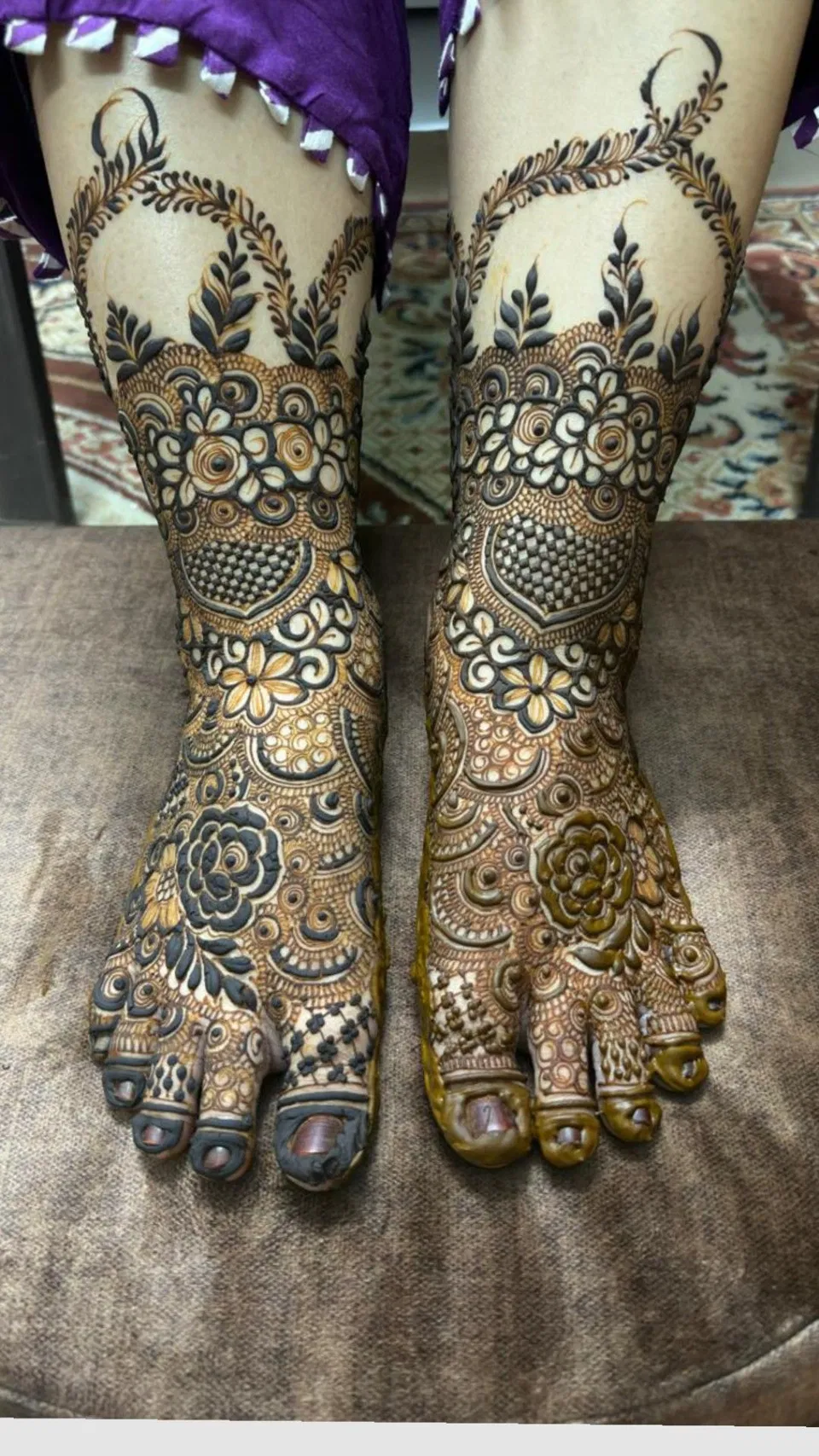 Bridal Stylish Back Hand Mehndi Design with Gol Tikki, Figures and Flowers for Engagement