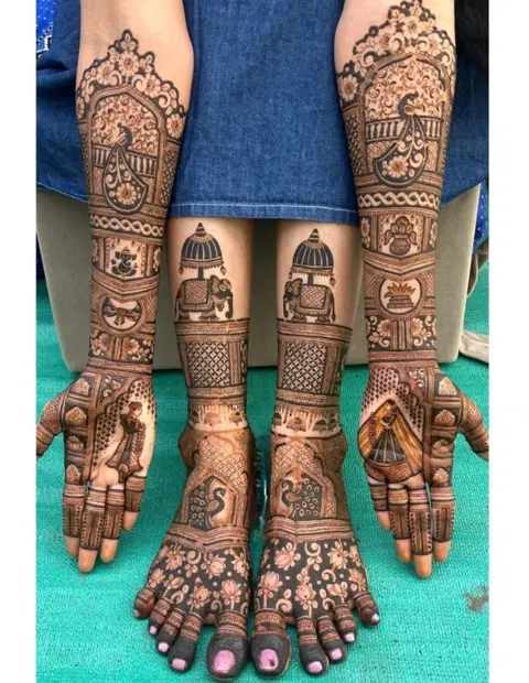 bridal stylish figure foot mehndi design