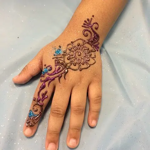 aesthetic arabic deity back hand mehndi design