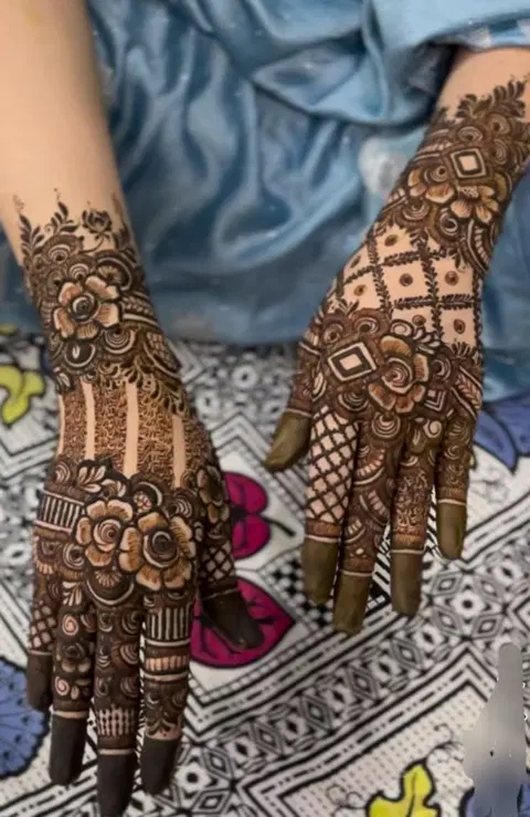 aesthetic bridal back hand mehndi design
